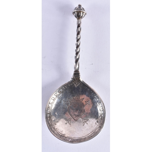 90 - A RARE 17TH CENTURY GERMAN SILVER SPOON with wyvern twisted handle, the bowl engraved with a motto a... 