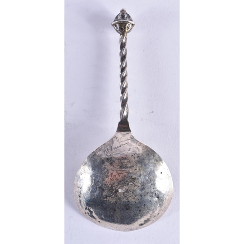 90 - A RARE 17TH CENTURY GERMAN SILVER SPOON with wyvern twisted handle, the bowl engraved with a motto a... 