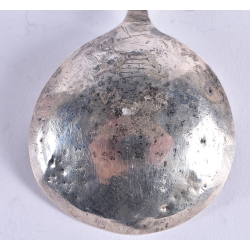 90 - A RARE 17TH CENTURY GERMAN SILVER SPOON with wyvern twisted handle, the bowl engraved with a motto a... 