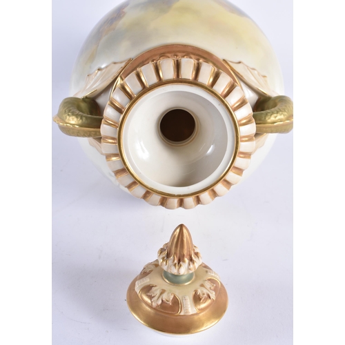 92 - A FINE LARGE ROYAL WORCESTER PORCELAIN TWIN HANDLED VASE AND COVER by John Stinton, painted with two... 