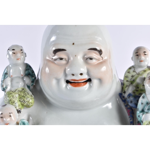 93 - AN EARLY 20TH CENTURY CHINESE FAMILLE ROSE PORCELAIN FIGURE OF A BUDDHA Late Qing/Republic, modelled... 