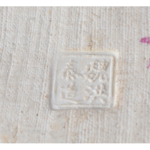 93 - AN EARLY 20TH CENTURY CHINESE FAMILLE ROSE PORCELAIN FIGURE OF A BUDDHA Late Qing/Republic, modelled... 