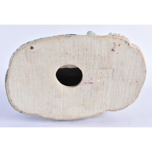 93 - AN EARLY 20TH CENTURY CHINESE FAMILLE ROSE PORCELAIN FIGURE OF A BUDDHA Late Qing/Republic, modelled... 