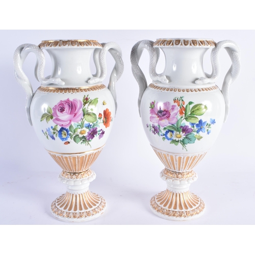 96 - A LARGE PAIR OF EARLY 20TH CENTURY GERMAN TWIN HANDLED MEISSEN PORCELAIN VASES painted with floral s... 