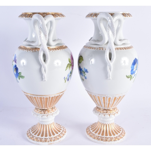 96 - A LARGE PAIR OF EARLY 20TH CENTURY GERMAN TWIN HANDLED MEISSEN PORCELAIN VASES painted with floral s... 