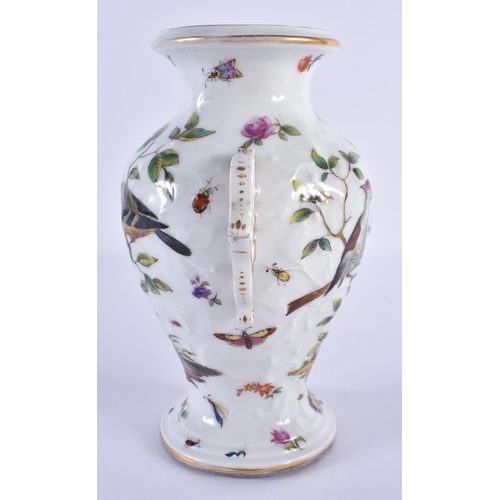 106 - AN AUSTRIAN TWIN HANDLED RELIEF MOULDED PORCELAIN VASE painted with birds amongst foliage and vines.... 