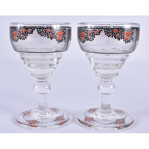 113 - A PAIR OF CONTINENTAL ART DECO GLASS VASES painted with fruiting glasses. 9.5 cm high.