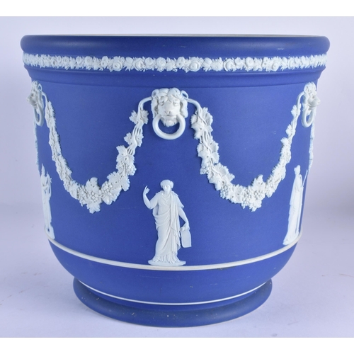 130 - A VERY LARGE WEDGWOOD BLUE BASALT JARDINERE decorated with classical figures, lions and trailing swa... 