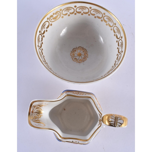 136 - AN EARLY 19TH CENTURY ENGLISH ROCKINGHAM STYLE TEA SERVICE comprising of 7 tea cups, 8 coffee cups, ... 