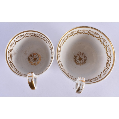 136 - AN EARLY 19TH CENTURY ENGLISH ROCKINGHAM STYLE TEA SERVICE comprising of 7 tea cups, 8 coffee cups, ... 