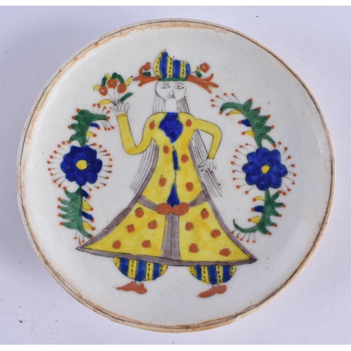 137 - A PAIR OF TURKISH KUTAHYA FAIENCE DISHES painted with figures. 14 cm diameter.