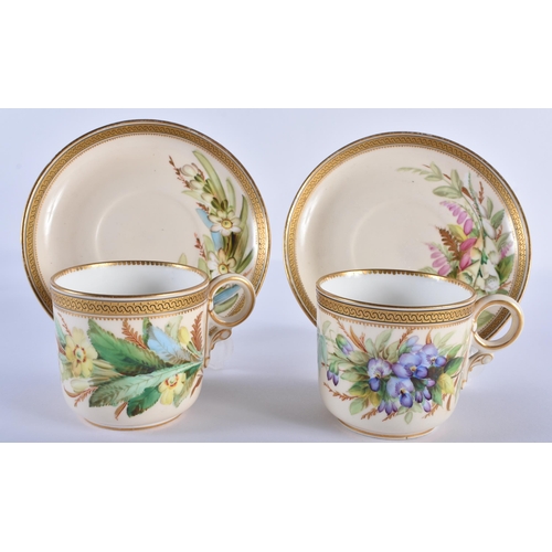 164 - Royal Worcester fine pair of teacups and saucers painted with flowers under a raised gilt border by ... 