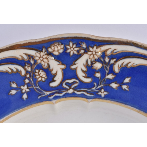 18 - AN EARLY 19TH CENTURY CHAMBERLAINS WORCESTER DEEP RELIEF MOULDED BOWL decorated on a scrolling blue ... 