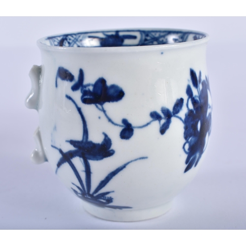 184 - Mid-18th century bell shaped coffee cup painted in blue with a fence, holed rock and bird, workmans... 