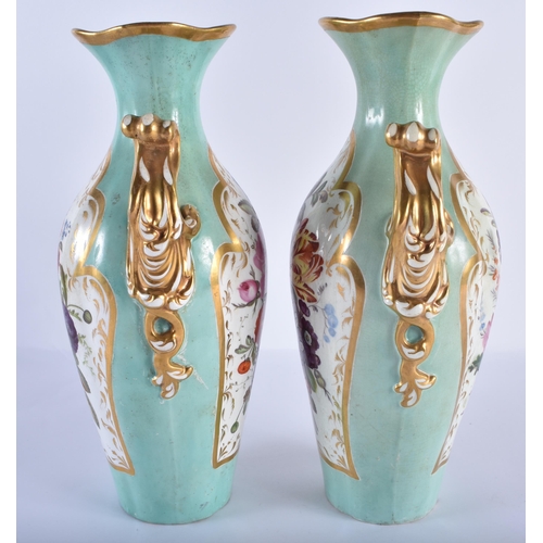 187 - Mid 19th century pair of two handled celadon ground vases lavishly painted with flowers, the interio... 