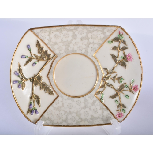 192 - Royal Worcester quadrilobed coffee cup and saucer moulded with prunus and other flowers painted in J... 