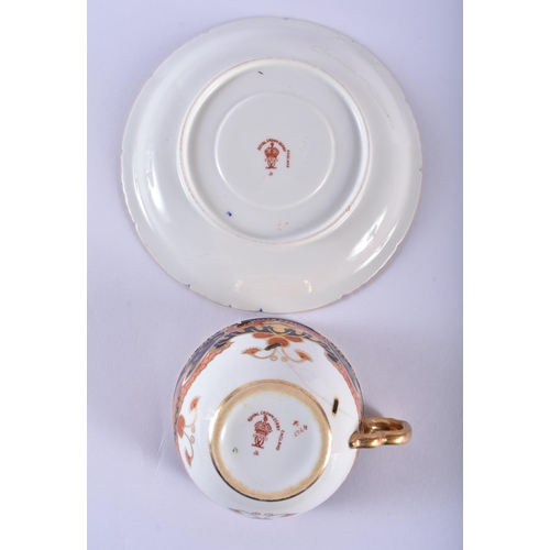 196 - Royal Crown Derby pair of teacups, saucers and side plates painted with an imari pattern. Cup 10cm h... 