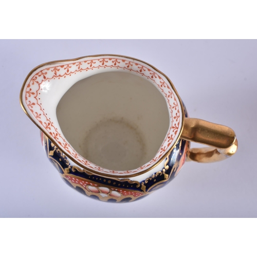 196 - Royal Crown Derby pair of teacups, saucers and side plates painted with an imari pattern. Cup 10cm h... 