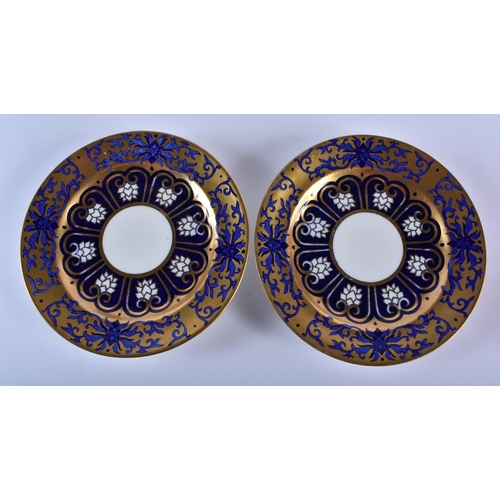 197 - Late 19th century Coalport pair coffee cups, saucers and side plates decorated with elaborate gildin... 