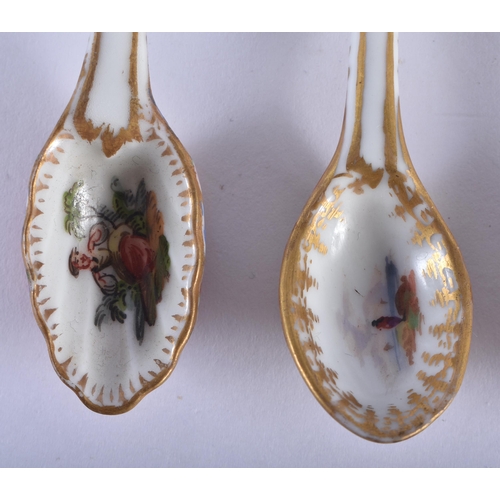 202 - Late 19th century German set of three small porcelain spoons painted with landscapes and flowers. Sp... 