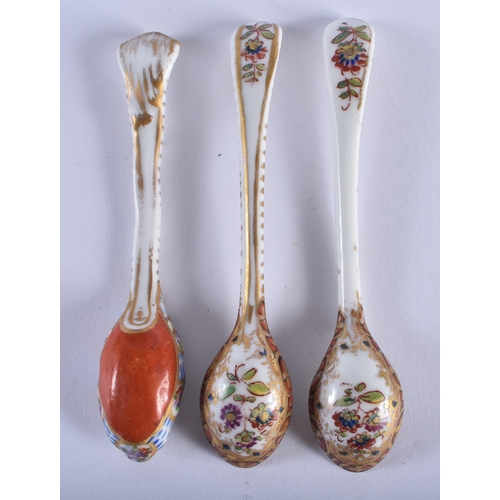 202 - Late 19th century German set of three small porcelain spoons painted with landscapes and flowers. Sp... 