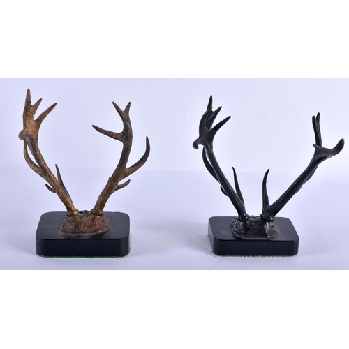 211 - A MATCHED PAIR OF ANTIQUE COLD PAINTED BRONZE STAG ANTLER PEN RESTS. 18 cm x 12 cm.