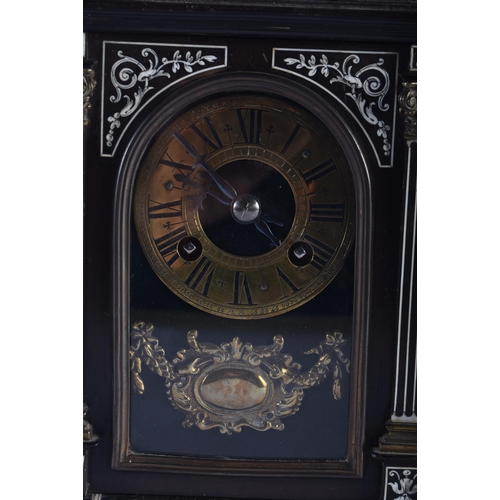 223 - A MID 19TH CENTURY EUROPEAN EBONISED MANTEL CLOCK decorated all over with foliage and motifs. 27 cm ... 