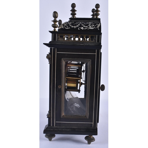 223 - A MID 19TH CENTURY EUROPEAN EBONISED MANTEL CLOCK decorated all over with foliage and motifs. 27 cm ... 