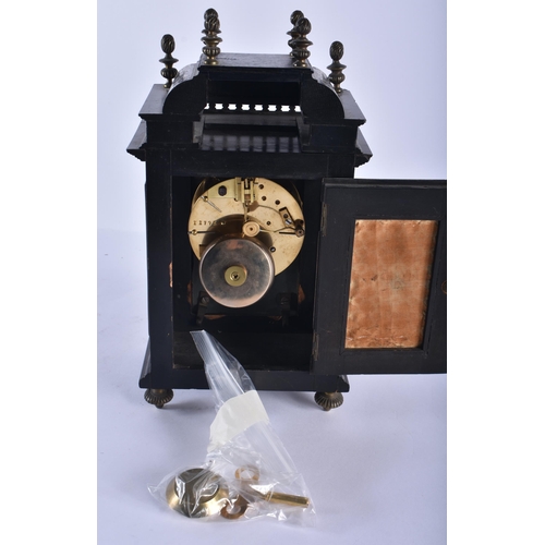 223 - A MID 19TH CENTURY EUROPEAN EBONISED MANTEL CLOCK decorated all over with foliage and motifs. 27 cm ... 