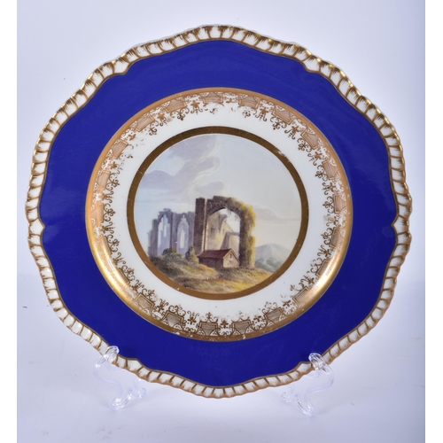 225 - AN EARLY 19TH CENTURY SPODE LANDSCAPE PLATE together with three Kerr & Binns Worcester plates. Large... 