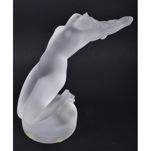 235 - A FRENCH LALIQUE GLASS FIGURE OF A NUDE FEMALE. 15 cm x 13 cm.