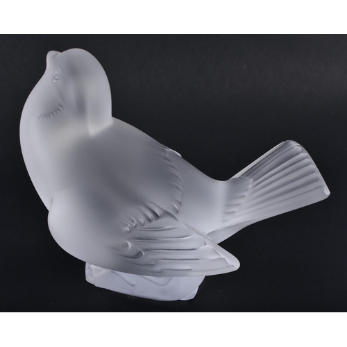 236 - A FRENCH LALIQUE GLASS BIRD. 10 cm x 9 cm.