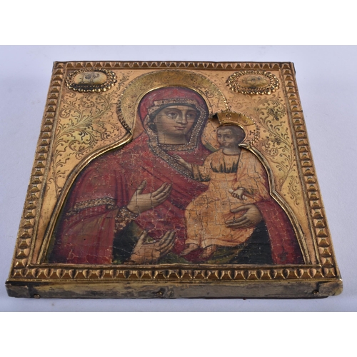 241 - AN ANTIQUE RUSSIAN PAINTED AND LACQUERED WOOD ICON. 14 cm x 12 cm.