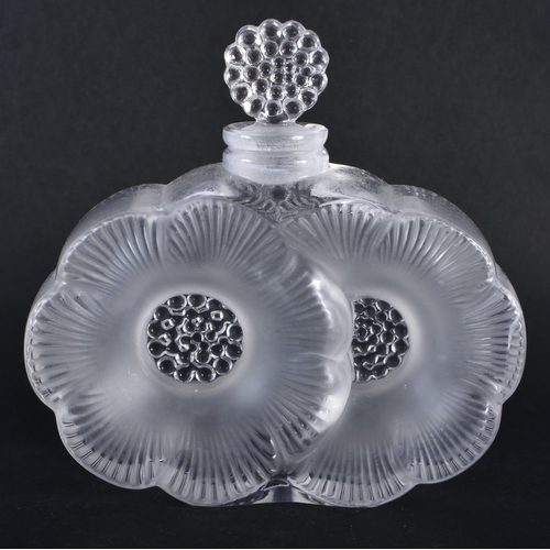 247 - A FRENCH LALIQUE GLASS SNUFF BOTTLE AND STOPPER. 9.5 cm x 9 cm.