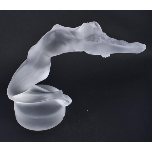 248 - A FRENCH LALIQUE GLASS FIGURE OF A RECLINING NUDE. 13 cm x 11 cm.