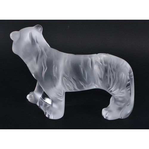 257 - A FRENCH LALIQUE GLASS TIGER. 12 cm x 8.25cm.