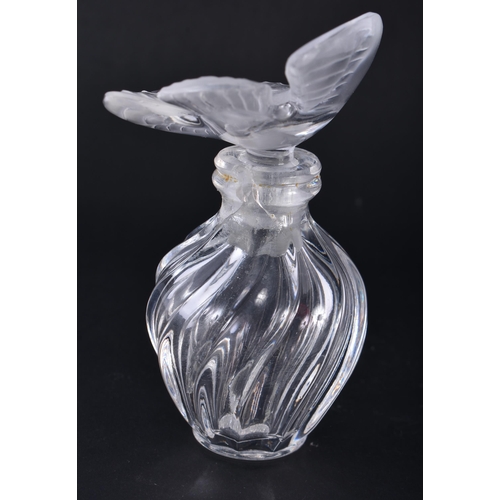 259 - A FRENCH LALIQUE GLASS BIRD SCENT BOTTLE. 8.75 cm x 5 cm.