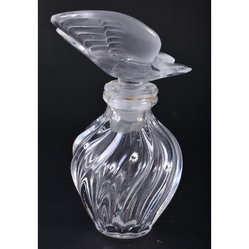 259 - A FRENCH LALIQUE GLASS BIRD SCENT BOTTLE. 8.75 cm x 5 cm.