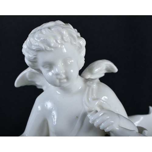 276 - A PAIR OF 19TH CENTURY CONTINENTAL WHITE GLAZED FIGURAL DISHES. 15 cm x 15 cm.