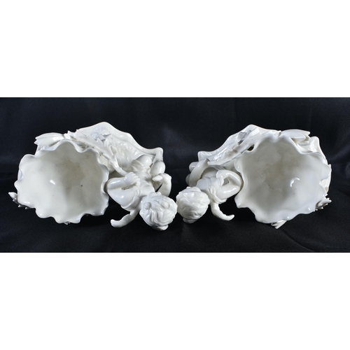 276 - A PAIR OF 19TH CENTURY CONTINENTAL WHITE GLAZED FIGURAL DISHES. 15 cm x 15 cm.