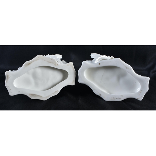 276 - A PAIR OF 19TH CENTURY CONTINENTAL WHITE GLAZED FIGURAL DISHES. 15 cm x 15 cm.