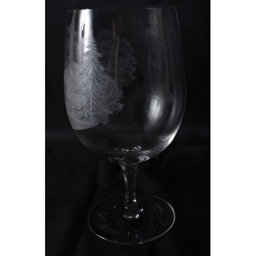 278 - AN ANTIQUE ENGRAVED COUNTRY HOUSE GOBLET. 21 cm high.