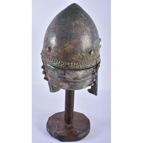 287 - A BRONZED POTTERY CLASSICAL HELMET. 38 cm high.