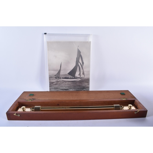 303 - A LOVELY 1930S MARITIME ROLLING CHART RULE within a fitted mahogany case, together with original pho... 