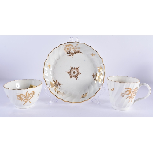 32 - THREE LATE 18TH/19TH CENTURY WORCESTER PORCELAIN TRIOS painted with gilt and flowers. (9)
