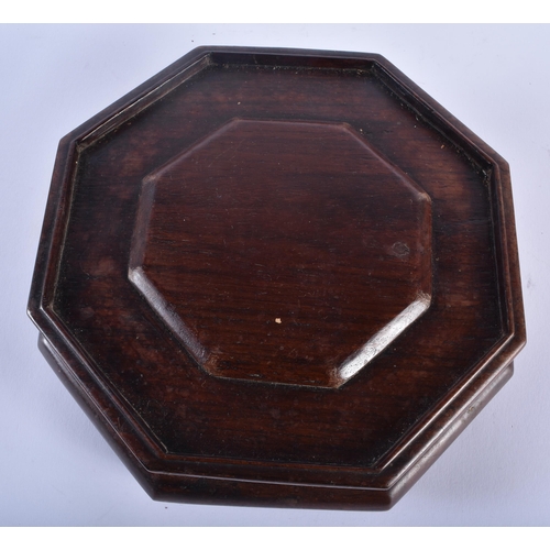 345 - A LARGE 19TH CENTURY CHINESE CARVED WOOD HEXAGONAL STAND Qing, possibly Huanghuali. 19 cm wide.