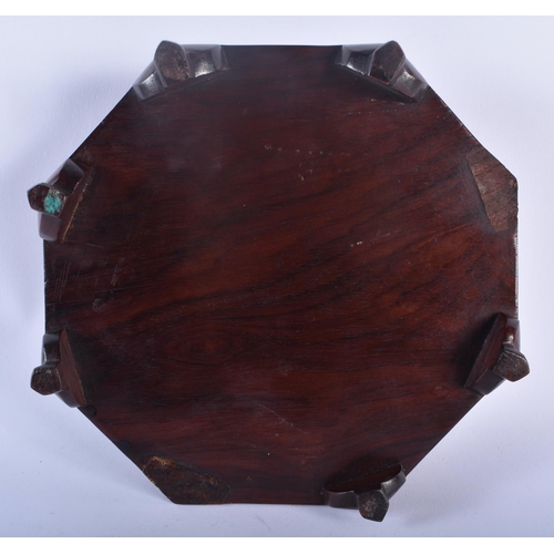 345 - A LARGE 19TH CENTURY CHINESE CARVED WOOD HEXAGONAL STAND Qing, possibly Huanghuali. 19 cm wide.