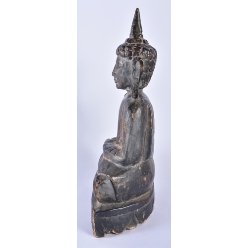 349 - A LARGE 19TH CENTURY SOUTHEAST ASIAN LACQUERED WOOD BUDDHA modelled upon a lotus base. 34 cm x 18cm.