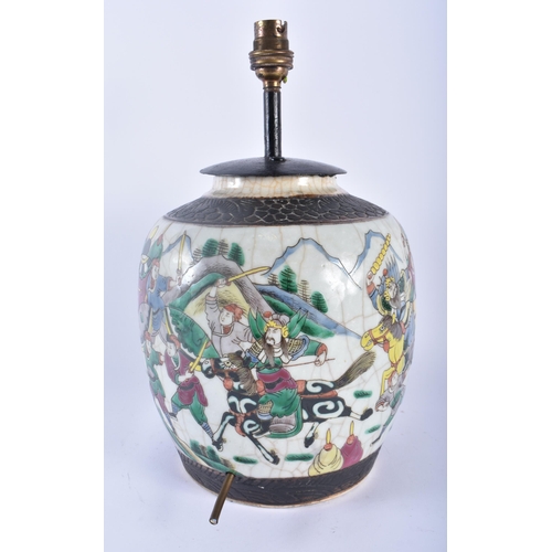 351 - A 19TH CENTURY CHINESE CRACKLE GLAZED FAMILLE VERTE LAMP painted with figures in landscapes. 34 cm x... 