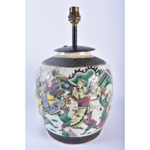 351 - A 19TH CENTURY CHINESE CRACKLE GLAZED FAMILLE VERTE LAMP painted with figures in landscapes. 34 cm x... 